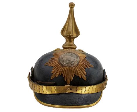 the black skull with gilt mounts to include state helmet plate, fluted spike finial with circular base and star rivets, multi