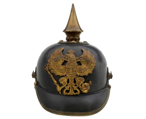 the black skull with gilt and brass mounts to include Line Regiment helmet plate with PENINSULA and WATERLOO battle honours, 