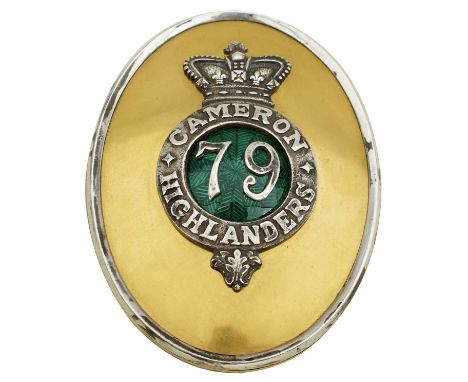 the oval gilt body with white metal edge, 79 centred on a green enamel ground surrounded by a white metal border inscribed CA