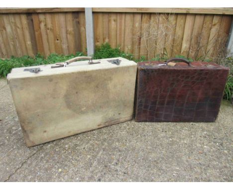 A vintage early 20th Century crocodile skin suitcase and a vintage vellum style suitcase (2)