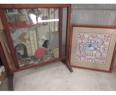 An Arts and Crafts oak fire screen with tapestry image and a Karfe - Fassett tapestry 