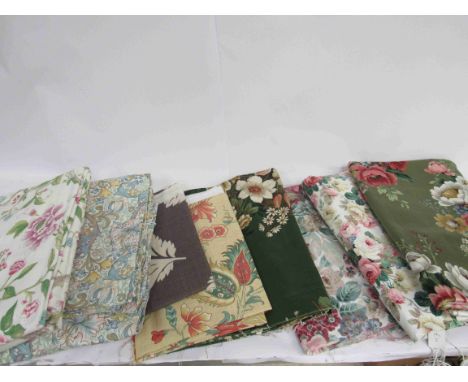 A box containing Arthur Sanderson's fabrics and curtains 