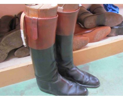 A pair of gents vintage black leather riding boots with tan leather tops complete with maxwell Savile Row wooden shoe trees