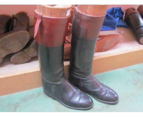 A pair of gents vintage black leather riding boots with twin leather tops with wooden shoe trees