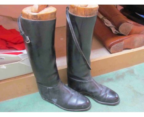 A pair of vintage gents black leather riding boots, complete with shoe trees