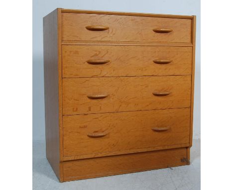 A retro vintage mid 20th century 1950s golden oak Brandon range G plan chest of drawers having a bank of four drawers with wo