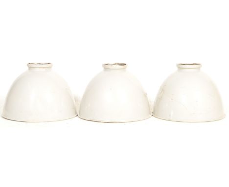 A group of three large retro vintage 20th Century Industrial porcelain enamel hanging pendant shades of large conical form. E