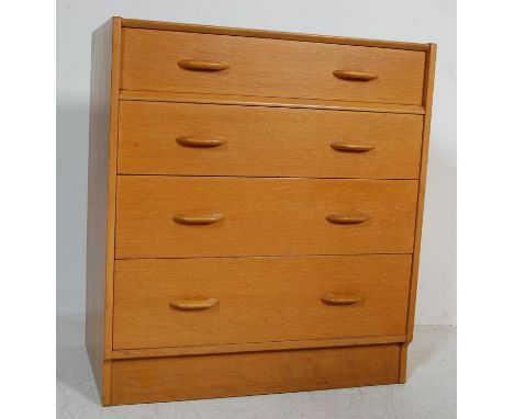 A retro vintage mid 20th century 1950s golden oak Brandon range G plan chest of drawers having a bank of four drawers with wo