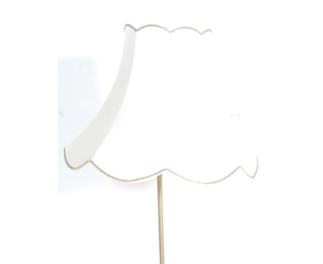 A retro vintage late 20th century standard lamp having circular resin decoration to the column raised on a metal circular bas
