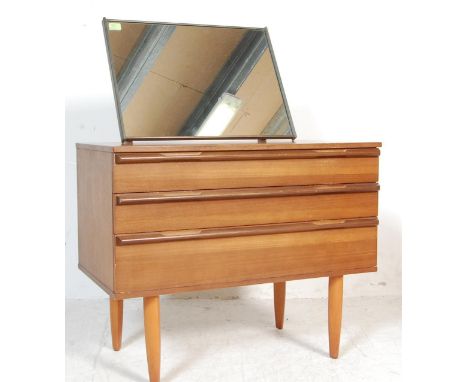 A vintage retro mid 20th century teak wood dressing table chest by Avalon. The dressing table having an adjustable angular mi