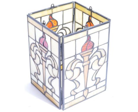 A vintage late 20th Century led lined stain glass hanging ceiling light shade in the manner of Tiffany &amp; Co. The shade ha