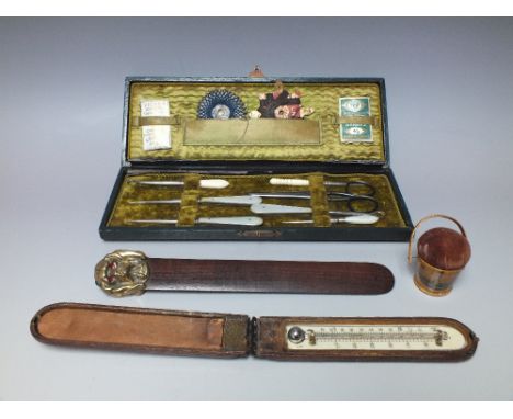 COLLECTORS LOT - A MAUCHLIN WARE PIN CUSHION, a cased thermometer, cased sewing set and a page turner (4)