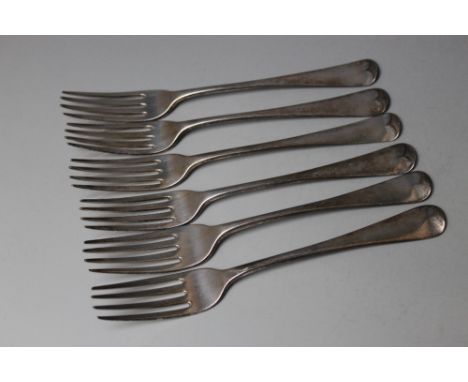 A MATCHED SET OF SIX HALLMARKED SILVER TABLE FORKS, consisting of four forks dated London 1817, maker's mark SH over SR over 