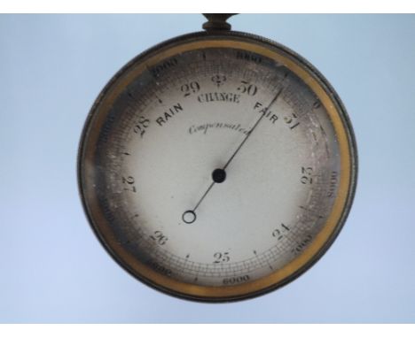 A METAL CASED COMPENSATED POCKET COMPENSATED ANEROID BAROMETER, Dia. 4.6 cm