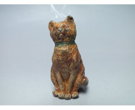 A VIENNA COLD PAINTED BRONZE CAT MARKED 'GESCHUETZT', in the form of seated cat with collar, impressed marks to base, H 6 cm
