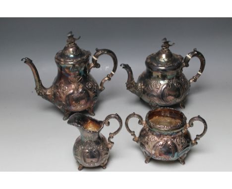 A HEAVY AND IMPRESSIVE FOUR PIECE HALLMARKED SILVER TEA AND COFFEE SERVICE BY ROBERTS & BELK LTD - SHEFFIELD 1975,  the tea a