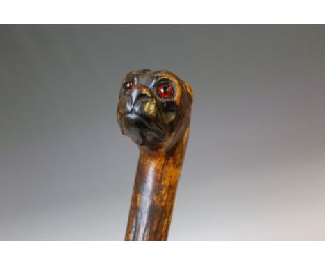 A CARVED WALKING STICK WITH BULLDOG HEAD HANDLE, circa 19th century, H 92 cm