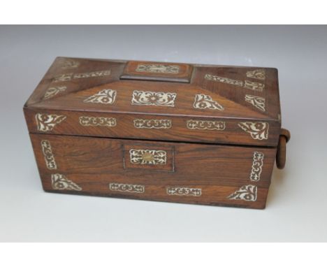 A 19TH CENTURY ROSEWOOD SARCOPHAGUS SHAPED TEA CADDY, with mother of pearl inlaid decoration, the interior with twin lidded c