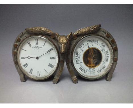 A COMBINATION CLOCK AND ANEROID BAROMETER, the clock dial inscribed 'Mappin & Webb, London' in horseshoe frame with central g