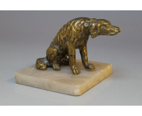 A GILT BRONZE MODEL OF A DOG, circa 19th century and sat upon a marble base sticking out his tongue! W 10 cm 