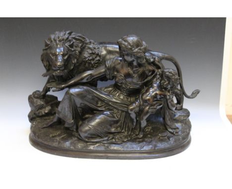 A LARGE BRONZE STUDY OF A LION WITH A WOMAN AND CHILD, signed to the base 'Bulio', H 45 cm, W 70 cm