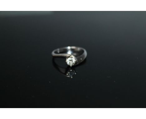 A WHITE GOLD DIAMOND SOLITAIRE RING,  stamped 750, set with a brilliant cut diamond of approx 0.30 carat, ring size M