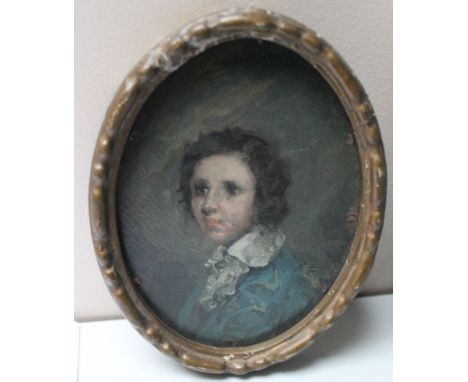 A LATE 19TH / EARLY 20TH CENTURY OVAL PORTRAIT MINIATURE OF A YOUNG BOY IN REGENCY ATTIRE, oil on card, unsigned, framed, 13 
