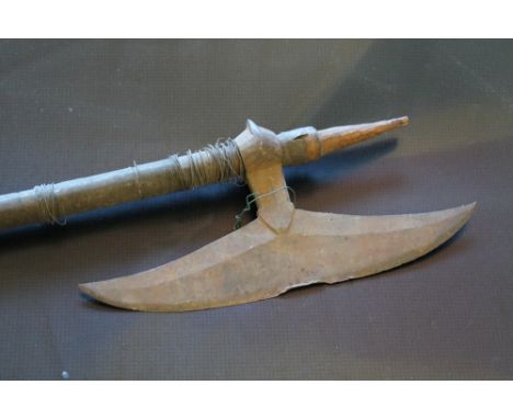 A LATE 18TH/EARLY 19TH CENTURY INDIAN BULLOVA AXE, with 30 cm blade, the 92 cm wooden shaft with wire binding (some loose) to