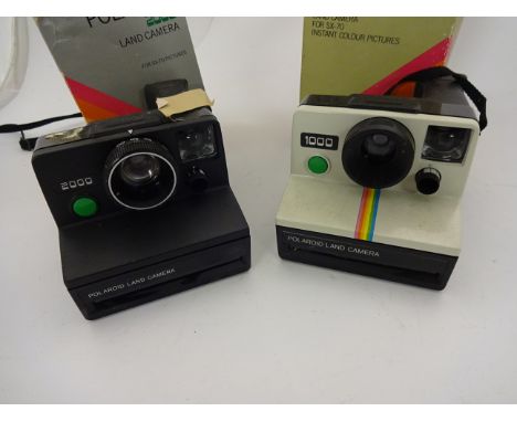 POLAROID 1000 AND POLAROID 2000 LAND CAMERAS