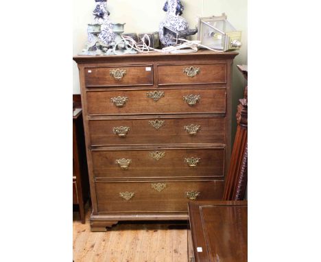 Georgian oak chest of two short above four long drawers on ogee bracket feet