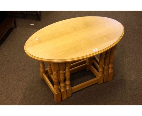 Oval nest of three light oak tables