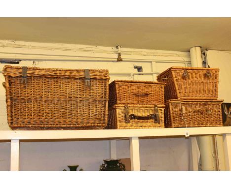 Large wicker trunk and four picnic baskets