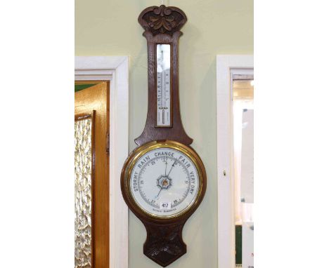 Carved oak aneroid barometer