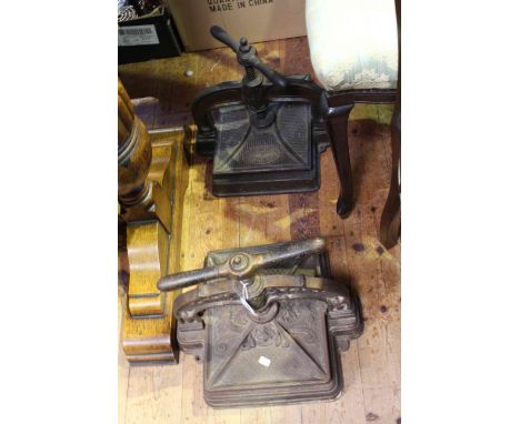 Two vintage cast book presses