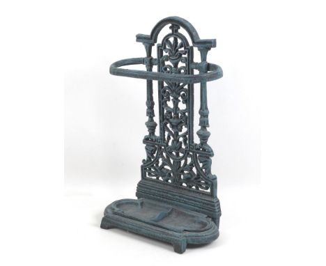 A modern reproduction metal stick stand, in Victorian style, painted in a green weathered style finish, 32 by 16 by 51cm high