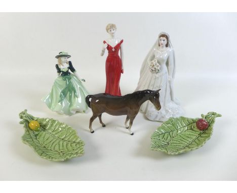 A small group of Royal Worcester and other ceramics, comprising a Royal Worcester figurine of Queen Elizabeth II in wedding g