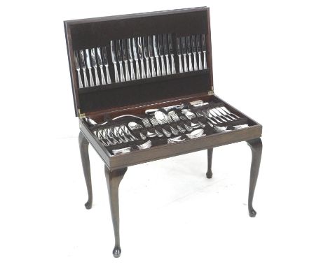 A suite of Osborne silver plated cutlery, in a modern mahogany canteen on stand, bead pattern, twelve place settings, 130 pie