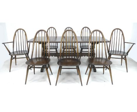 A set of eight Ercol dark stained stick back dining chairs, 'Quaker Windsor Chair', model 365, 49 by 55 by 95cm high, includi