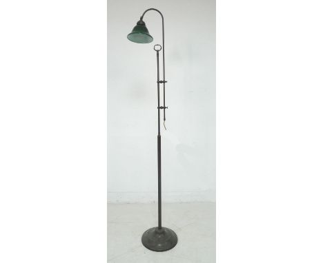 An Edwardian style standard lamp, late 20th century, with part reeded column, adjustable height fitting with glass shade, gre