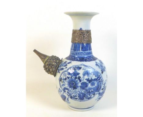 A Chinese porcelain pouring vessel 'kendi' vase, Qing Dynasty, 18th century, with flared rim on a long neck, bulbous body and