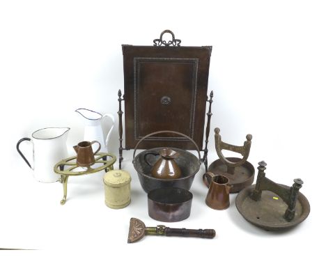 A group of thirteen various vintage metal wares, including two boot scrapes, a firescreen, jamming pan, and some copper and e