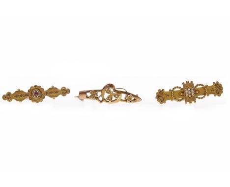 THREE VICTORIAN BROOCHEScomprising two nine carat gold examples both set with seed pearls, 5.6g gross and a fifteen carat gol