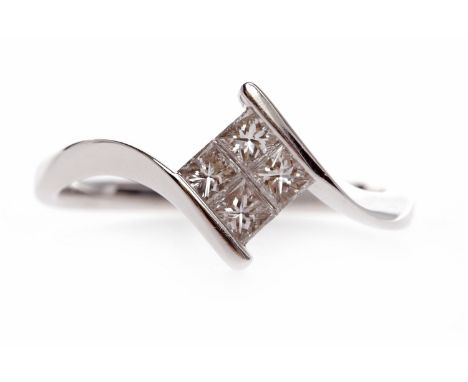 EIGHTEEN CARAT WHITE GOLD DIAMOND RINGset with four princess cut diamonds totalling approximately 0.50 carats, in a twist set