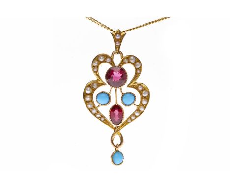EDWARDIAN NINE CARAT GOLD GARNET AND SEED PEARL PENDANTopenwork and set with an oval and a round garnet each in millegrain ed