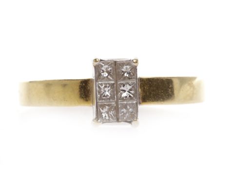 EIGHTEEN CARAT GOLD DIAMOND DRESS RINGthe rectangular bezel set with six princess cut diamonds totalling approximately 0.30 c