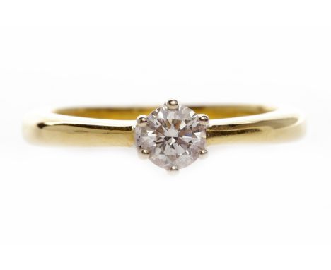 DIAMOND SOLITAIRE RINGset with a round brilliant cut stone of approximately 0.30 carats, in eighteen carat gold, size J-K, 3.