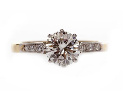 EIGHTEEN CARAT GOLD DIAMOND SOLITAIRE RINGthe round brilliant cut diamond of approximately 1.01 carats, on diamond set should
