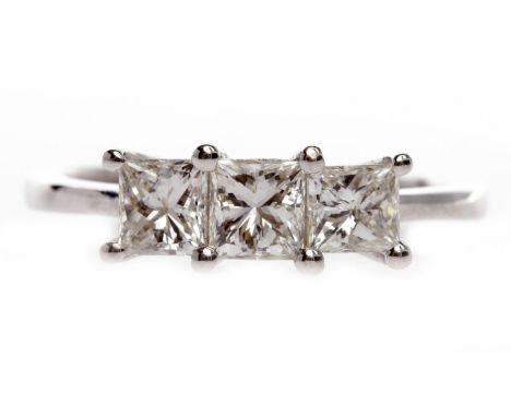 EIGHTEEN CARAT GOLD DIAMOND THREE STONE RINGset with a central diamond of approximately 0.35 carats, flanked by two smaller s