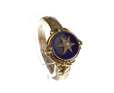 VICTORIAN GOLD ENAMEL AND DIAMOND BRACELETwith a central round locket section 31mm diameter, the lid enamelled in blue and wi