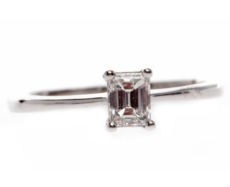 EIGHTEEN CARAT GOLD DIAMOND SOLITAIRE RINGset with an emerald cut diamond of approximately 0.49 carats, size P, 2.7g